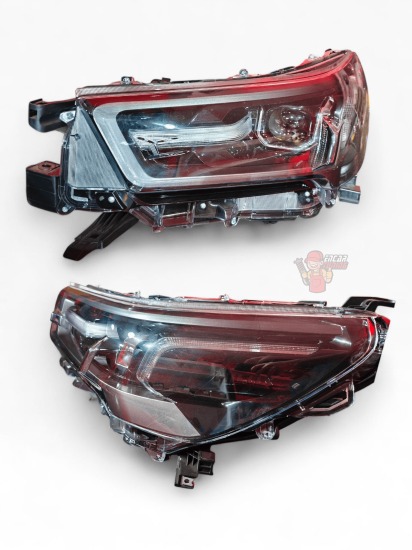 FARO DELANTERO GRAFITO HILUX UND 16+ LADO CONDUCTOR